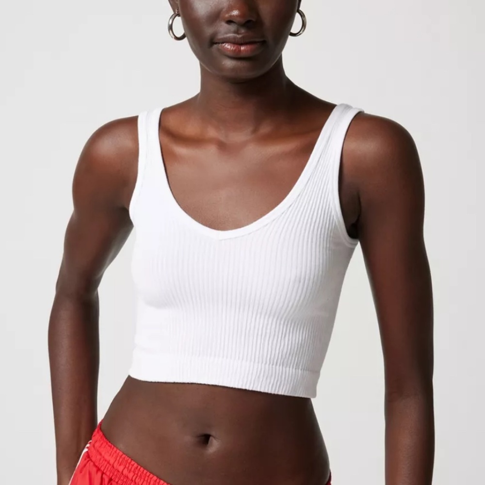 Urban Outfitters cropped out from under tank top